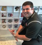 Future College Coach Brad Bez Squatting Next to Logos