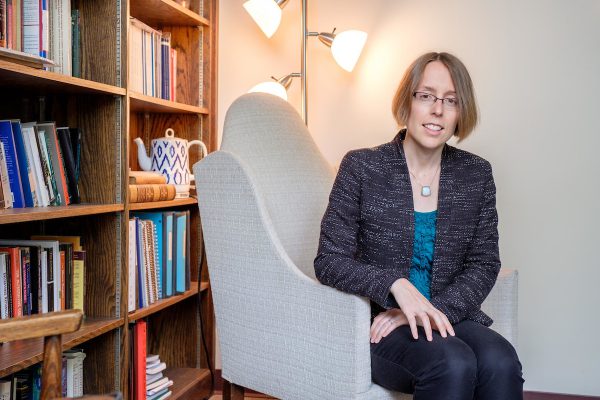 Christina Carroll, one of five endowed chairs, sits in her office