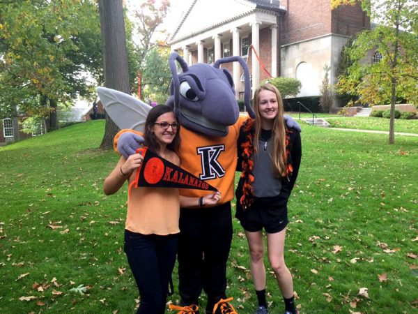 Two students with Buzz the Hornet at Homecoming 2017