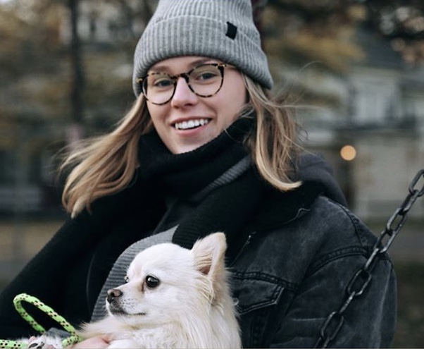 Kalamazoo Promise Student Druanna Darling with a dog