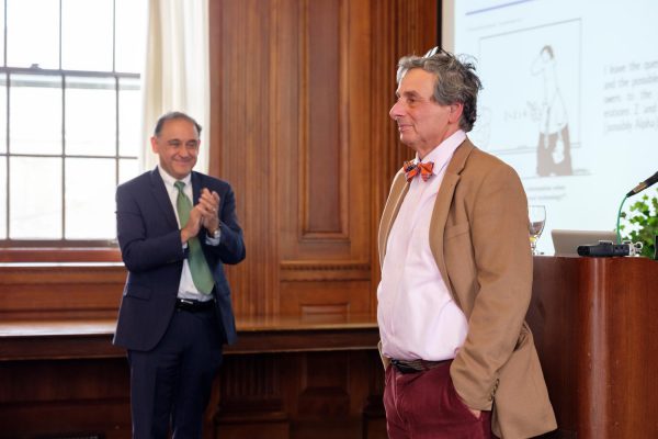 K President Jorge G. Gonzalez applauds Professor Peter Erdi at Rankings Presentation
