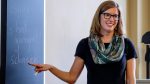 German Studies Co-Chair Kathryn Sederberg Teaching at a Blackboard
