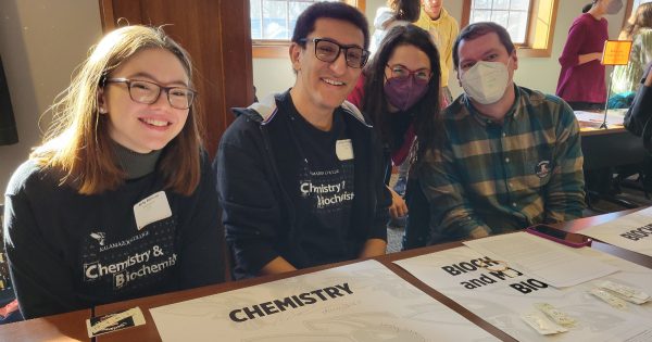 Red Cross Club leader Abby Barnum with others from the Department of Chemistry registering students as majors in the department