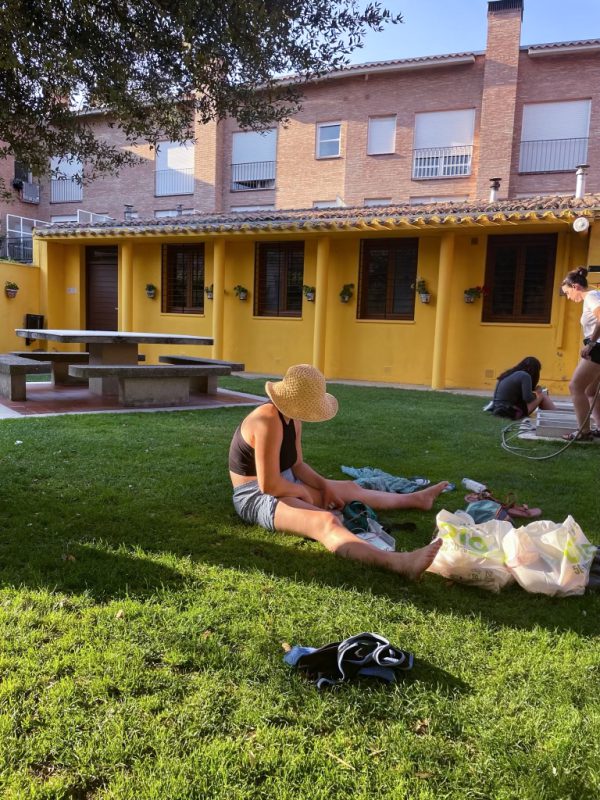 O'Rielly organizes documents from her interviews at an albergue along her route on the Camino de Santiago