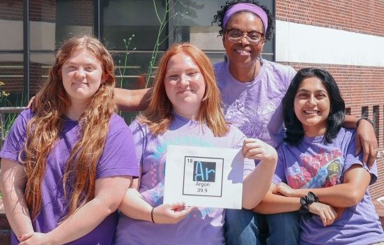 'Wait, Why': Regina Stevens-Truss with three students