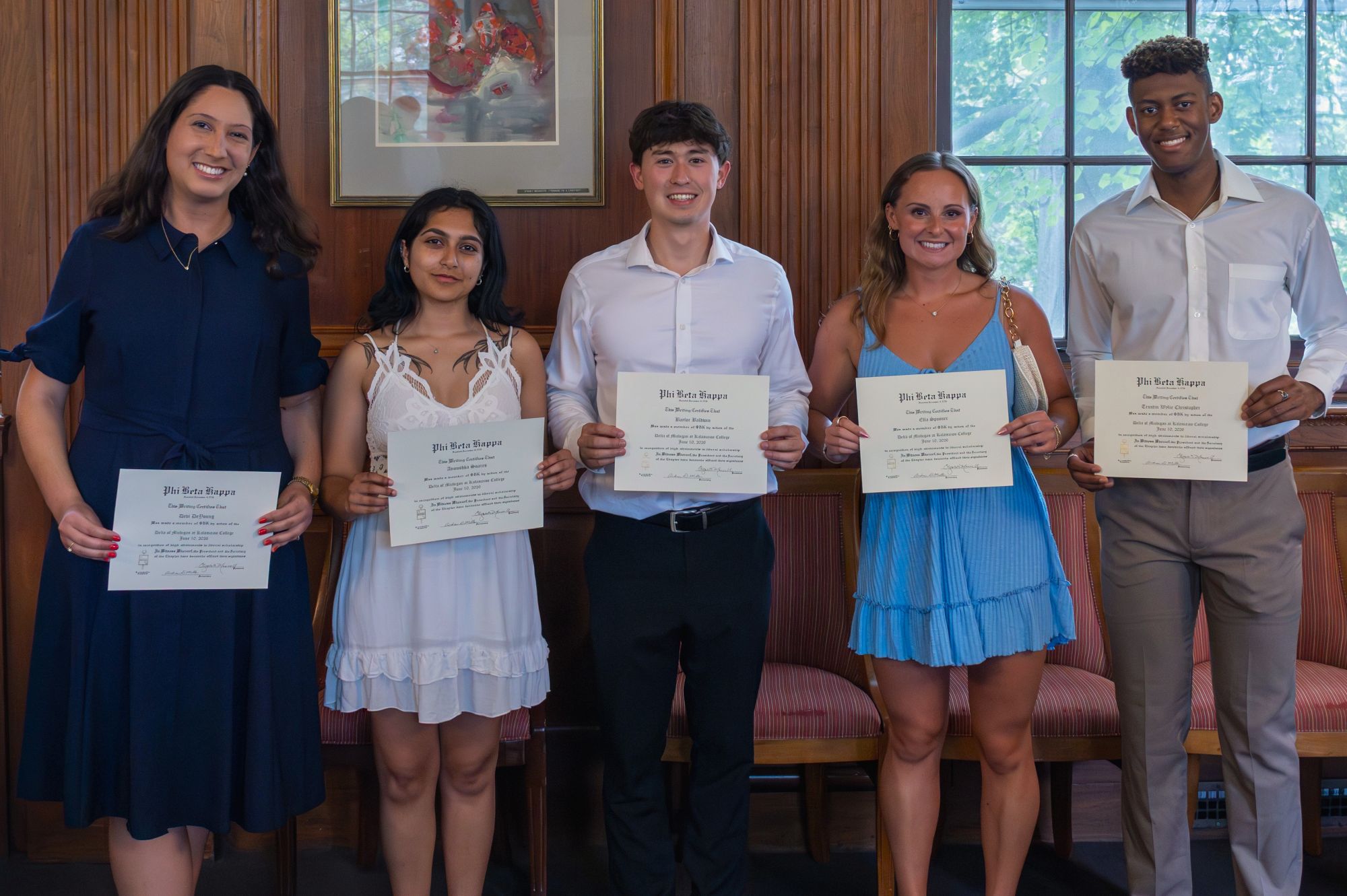 Five students with Phi Beta Kappa certificates
