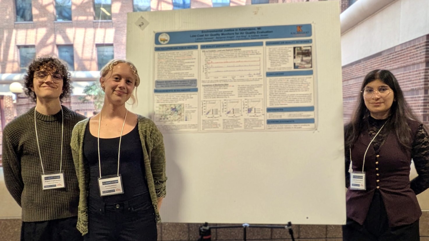 Three researchers from Andrew Jensen's lab, including student-athlete Ava King, present research at the University of Michigan