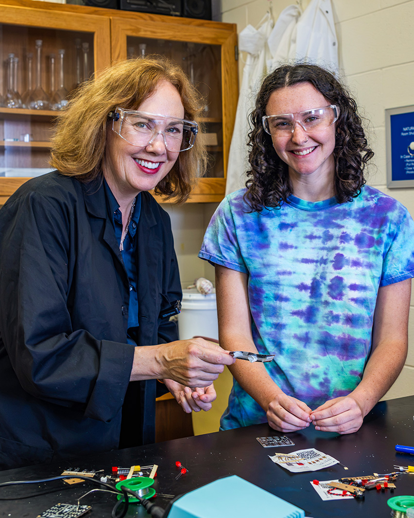President Crowley with a chemistry student in the lab
