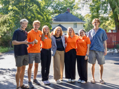 SJS_Hodge House _2026 President Crowley with six students at Hodge House