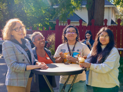 SJS_Hodge House _2026 President Crowley, Karen Isble, and students at the first-year ice cream social