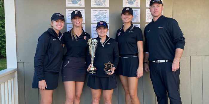 Women's Golf Team with award