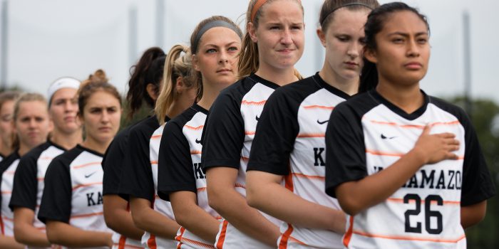 women's soccer team standing in a line