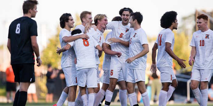 men's soccer team celebrating