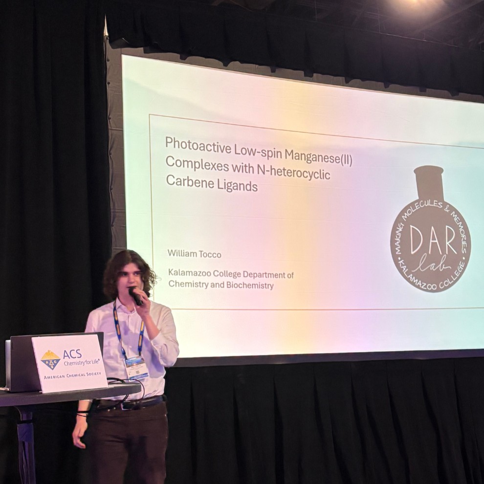 Student presenting his research at ACS Conference in Atlanta