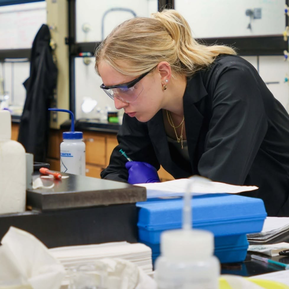 Olivia Cannizzaro works in Dwight Williams' chemistry lab