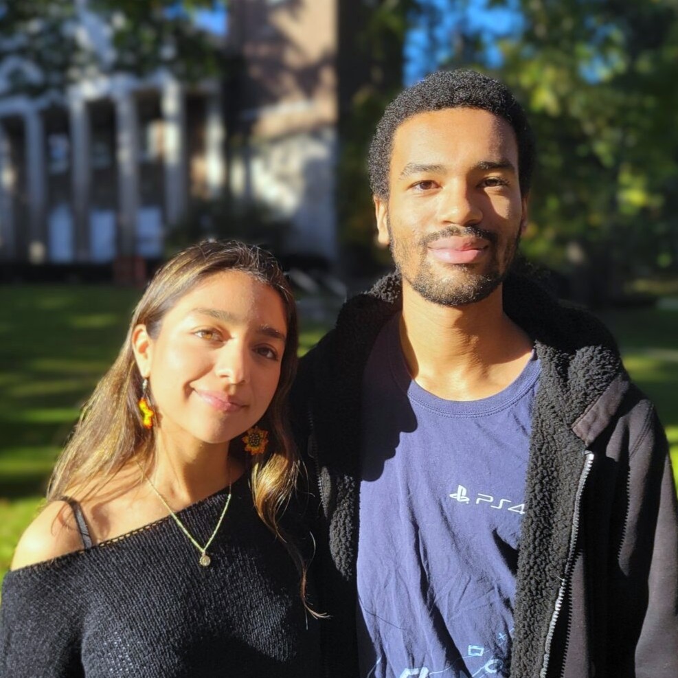 Two students on the Quad near Stetson Chapel